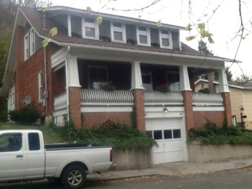 Beautifully restored home w/ great in-town location. The wood work found throughout has to be seen to be appreciated. Beautiful wood French doors grace the entry and lead into a beautiful living room. The sunroom is found off the formal dining room makes a great place for family and entertaining. The eat-in kitchen and 2 BA add to the appeal of this home. Add central air, an integral garage and 3 lg BR and you have a home that you can be proud of.