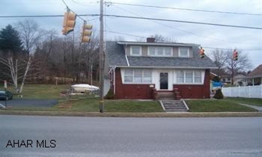 Charming 3bed/1.5 bath brick home with natural woodwork, hardwood floors, some stainglass windows and gas fireplace. This home also has a recently remodeled kitchen, full basement with laundry, tv room, 1/2 bath and workshop. Large covered patio great for outdoor entertaining. Move right in for $97,500. Call Shari 944-2325. Owner Financing Possible.