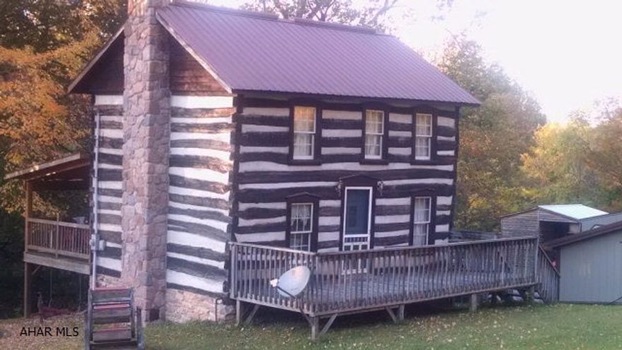 Definitely One of a Kind home, built in approx. 1810 has a unique layout and beauty-Det. 24 x 24 2-car garage plus a 4 bay 72 x 28 garage. Situated on 2.7 private acres. Call Listing Agent for an appt.