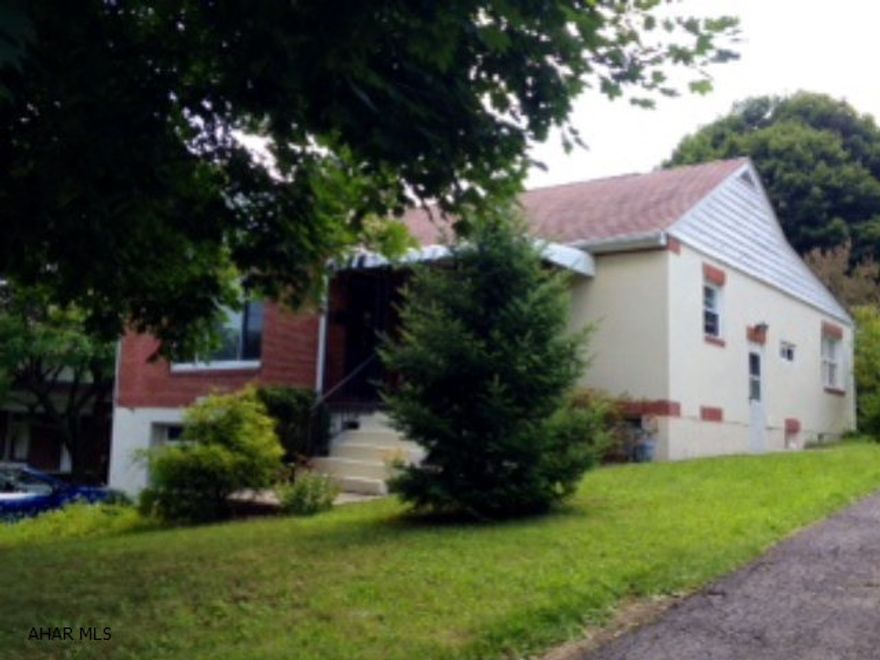 Adorable one story with many updates.  3 Bedroom with modern kitchen and baths situated on a beautiful lot with mature trees and pond.