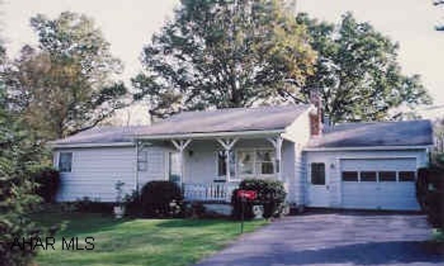 Small well-maintained 2 bedroom, 2 bath rancher on picturesque and secluded lot.  An inviting front porch, rear deck and 1 car garage make this a very attractive home.