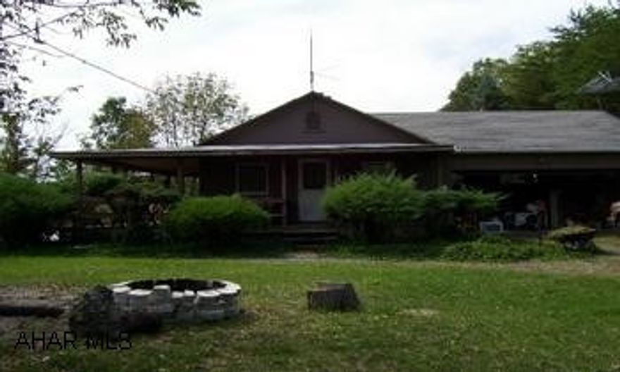 Your own private get-away. 2nd cabin in the back yard is A-framed with a loft. Week-ends are made for this! These peaceful, rustic cabin retreats are downright therapeutic. There are 2 cabins for the price of 1 all on 3.75 acres. Only minutes from Lake Raystown. All appliances and storage shed included. 2820