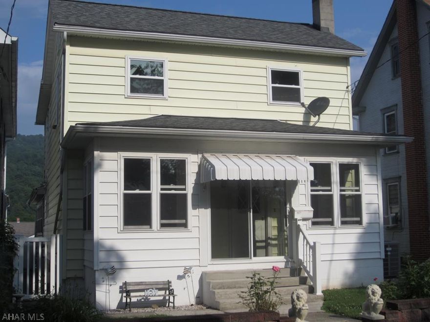 Nice, well maintained 2 story with one car detached garage and off street parking in the rear.  The house has 4 Bedrooms, 2 full Baths, large laundry room on 1st floor and nice kitchen-dining area, new carpet and vinyl flooring in many rooms with fresh paint thru-out.  Oil fired forced air heat with air conditioner.  Upgraded breaker panel box and thermo pane windows.  This home is in move in condition.