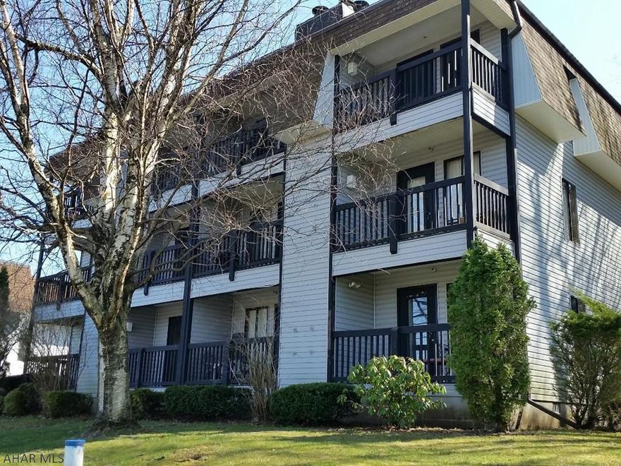 2nd-floor fully furnished condo, separate private bedroom, plus hallway with built-in bunkbeds, and Living Room has futon sofa for sleeping for 6.  Nice balcony off living room overlooking tennis courts and inground pool!  New carpet! Electric system is breakers.  $172.00/mo HOA dues include:  hot tubs, tennis courts, indoor/outdoor pools, road maintenance and trash removal.  (Skiing & golf for a fee).  Sq ft per tax card - buyer to verify sq ft & taxes.  #J-492