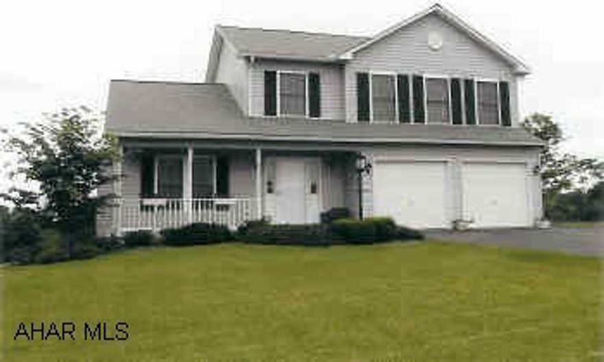 2-Story Shuttered Vinyl-sided home with beautiful view. RV Garage  Neutral colors, real hardwood floors, stained woodwork, full basement is plumbed for full bath, bilco outside entrance door.