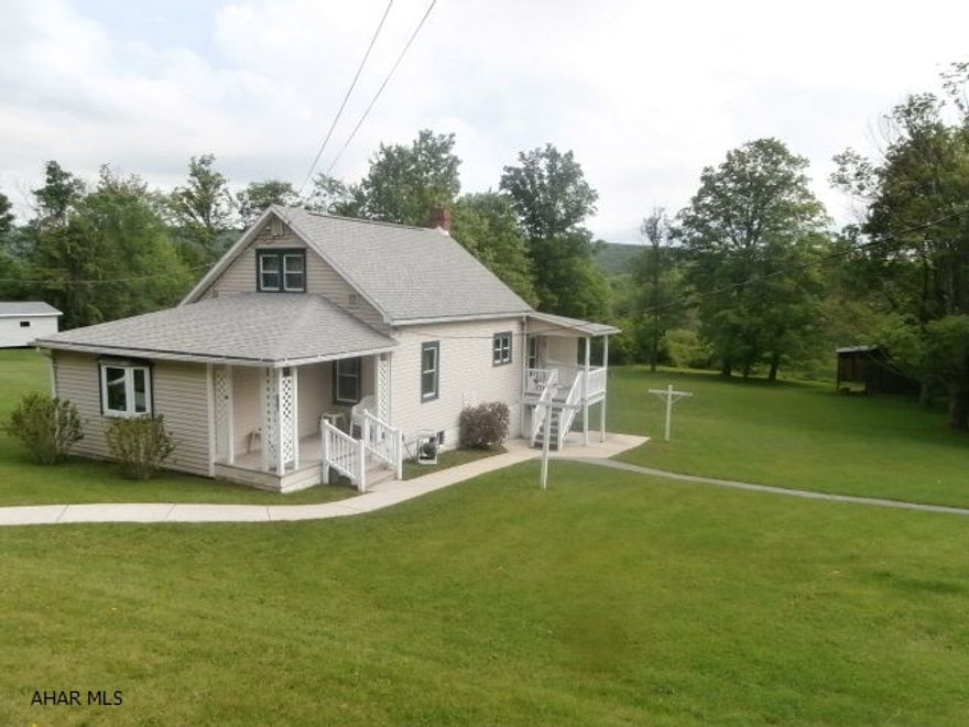 Well maintained home with large lot and two car detached garage. Storage under garage. Paved drive. Very clean home. Storage shed. Short walk to Patton Park.