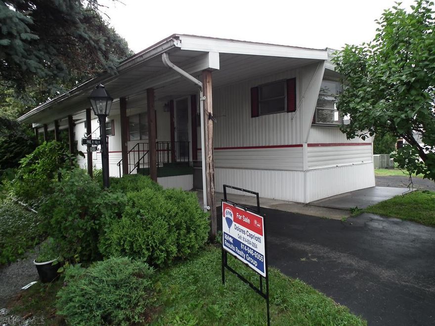 Located in 55+ Eldorado Mobile Home Park. New carpeting, freshly painted, washer and dryer included. 8 x 8 x 1 Shed included.