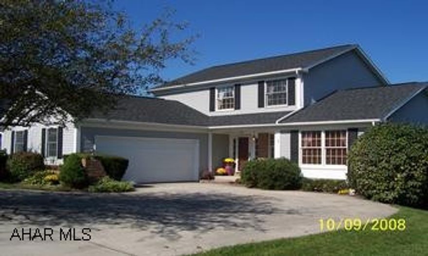 You won't believe how much space! Vaulted pine ceilings in kitchen, french door to deck with unbelievable view. First fl den could be 4th bdr. Screened in porch. Master bedroom, bath and dressing area. Both 2nd fl baths have just been recently redone.Full finished basement with bar, workshop, office area. 2 car garage. Professional landscaping front & back. Must see!