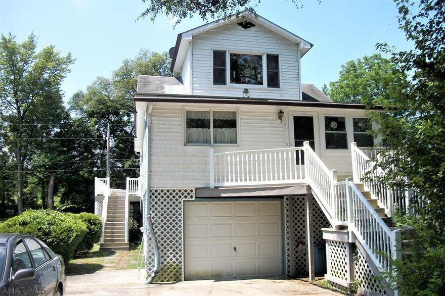 If you are looking for river front living that is only a few minutes from downtown Bedford, the PA Turnpike and Interstate 99, then this spacous, move-in ready home is for you. Enjoy the outdoors sitting on one of the composite decks. This raised ranch home has offers plenty of natural light due to lots of windows and skylights. This home has oil forced air heat, and a heat pump with central air conditioning. The spacious great room has plenty of area for entertaining.  Recreational opportunities abound with this river front property; canoing, kayaking, fishing or boating. Take a float or paddle by, take a look and make this your river front home! Buyer to verify square footage and acreage.