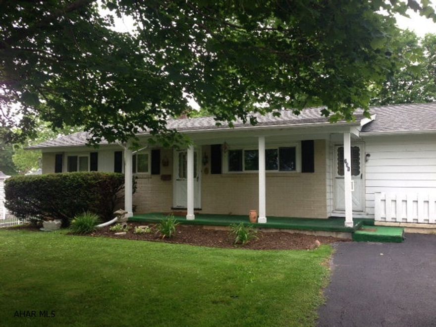 Sweet home in fantastic neighborhood. Lots of potential with large eat-in kitchen. Spacious laundry room, 2 full bath and full basement with work benches and storage shelves. Quiet street and close to town.