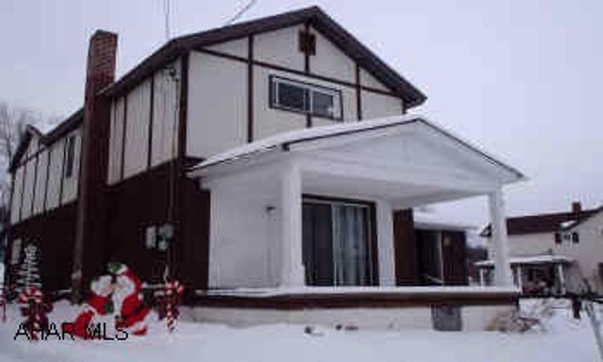 RT 53 THRU LILLY GO OVER BRIDGE MAKE A RIGHT THAN MAKE A LEFT ONTO BAKER STREET 2 STORY HOME WITH MANY POSSIBILITIES, NICE 2 STORY 4 BEDROOM HOME