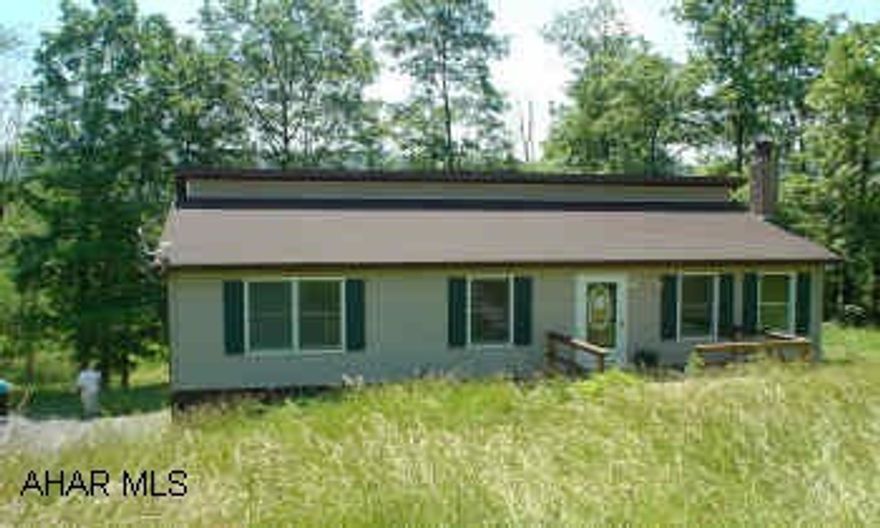 3 bedroom, 2.5 bath ranch with finished basement on almost an acre of ground. Oil stove in family room.