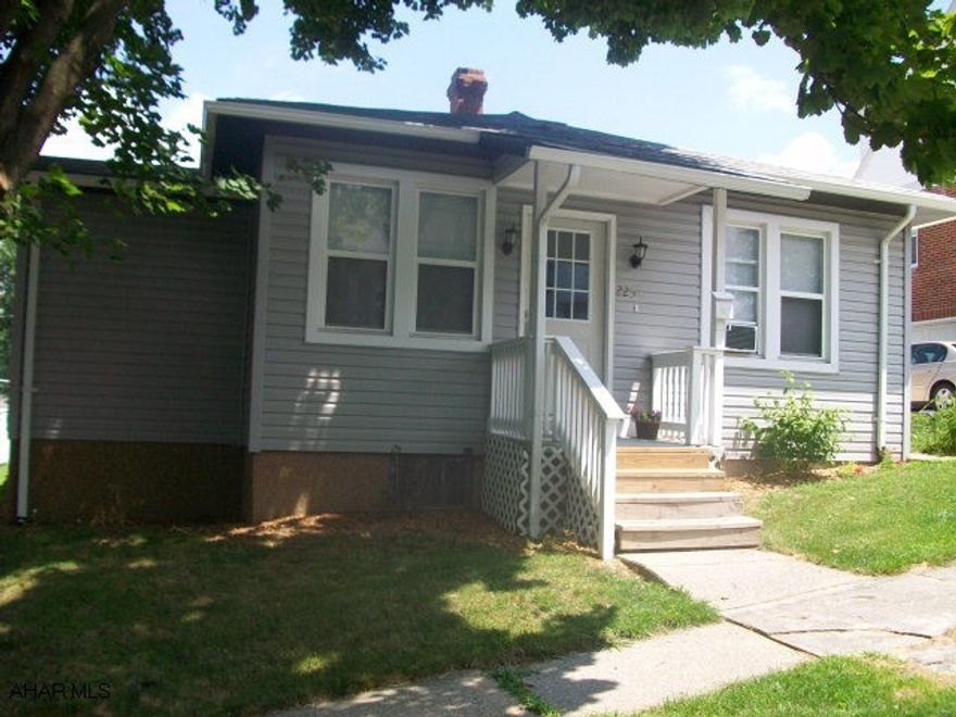 Modern one story home perfect for a starter or downsizer!  Bright oak kitchen with refrigerator and range, large bathroom with storage. The rear yard is fenced with off street parking available.  See interior photos!