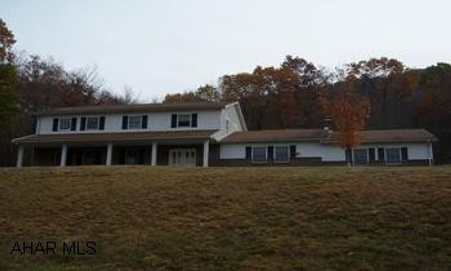 2 story on 7 acres 2 story 5 bedroom 3 .5 baths on 7 acres with awesome views.  large kitchen and dining room with fireplace. 5 bedrooms including 2 masterbedroom suites.