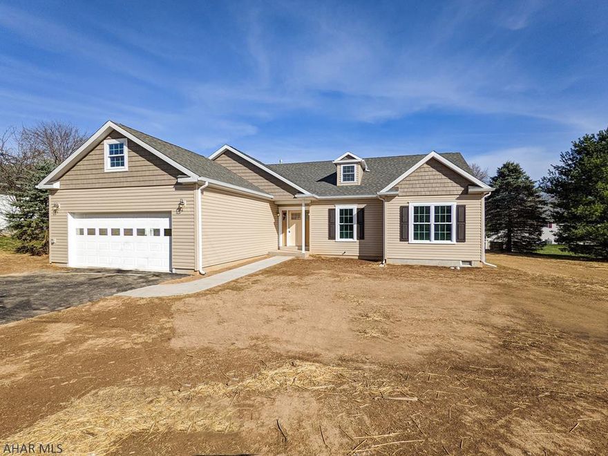 New construction Ranch home one story living in Old Town Village. This home features granite countertops and upgraded finishes including vinyl plank and ceramic tile flooring. Fireplace and incredible master bedroom with master bath suite. Includes 2 car garage, Frigidaire stainless kitchen appliances, asphalt driveway and completed landscaping with reseeding. Finished rear deck. Many upgrades are built into this home including a soaking tub, 8 1/2 foot ceilings and 36" doors for accessibility. Tons of storage with an attic which has a full floor. Seller is a licensed real estate agent. Taxes are for the lot and will be adjusted at final completion.