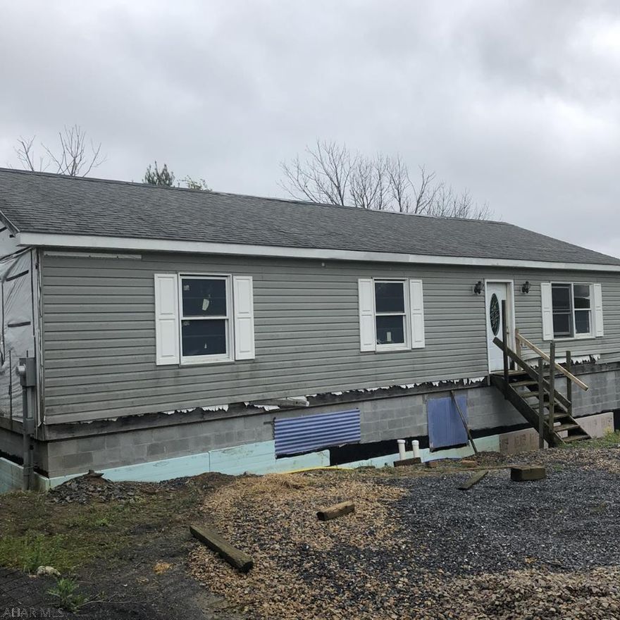 Perfect opportunity to finish this 1 story 3 BR, 2 bath home in Ebensburg. Sewer tap paid.  Water tap needs paid. 80 x 100 lot