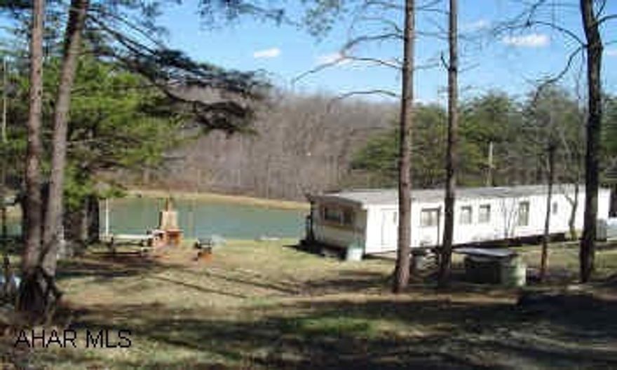 1974 (60x12) Newport, 2 bedrooms, 1 bath, oil FHA, front stoop, rear covered porch, and a 10x12 storage shed.     1974 (60x12) Newport, 2 bedrooms, 1 bath, oil FHA, front stoop, rear covered porch, and a 10x12 storage shed.