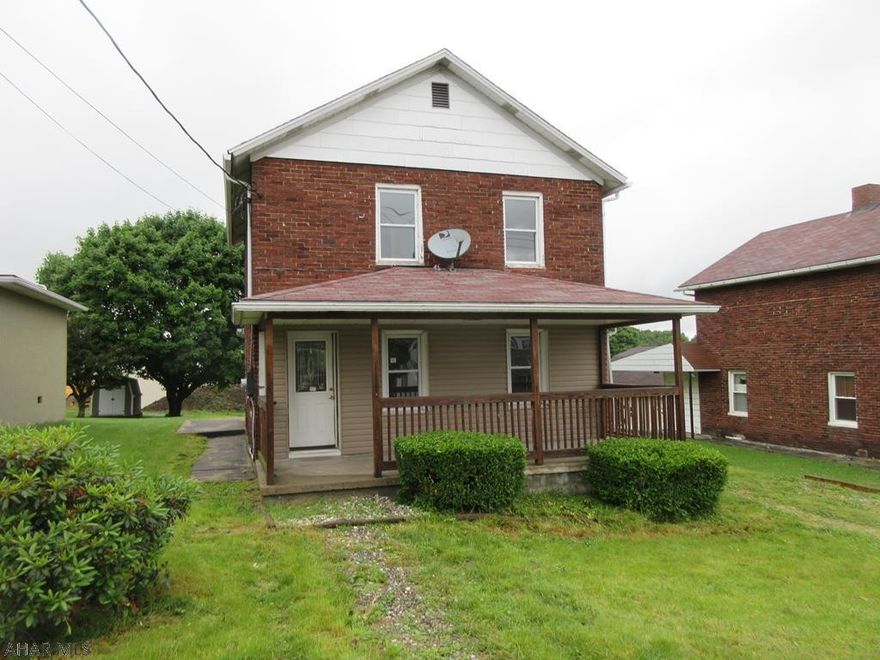 Revloc 2 story solid brick home with updated kitchen and bath. Large living room with laminate flooring, formal dining room opens up to kitchen. Great area with nice backyard and shed. Needs a little TLC in some places, but really nice home for the right buyer. AS-IS sale. Seller will make no repairs. Buyer responsible for any required municipal sewer testing and escrow/repairs.