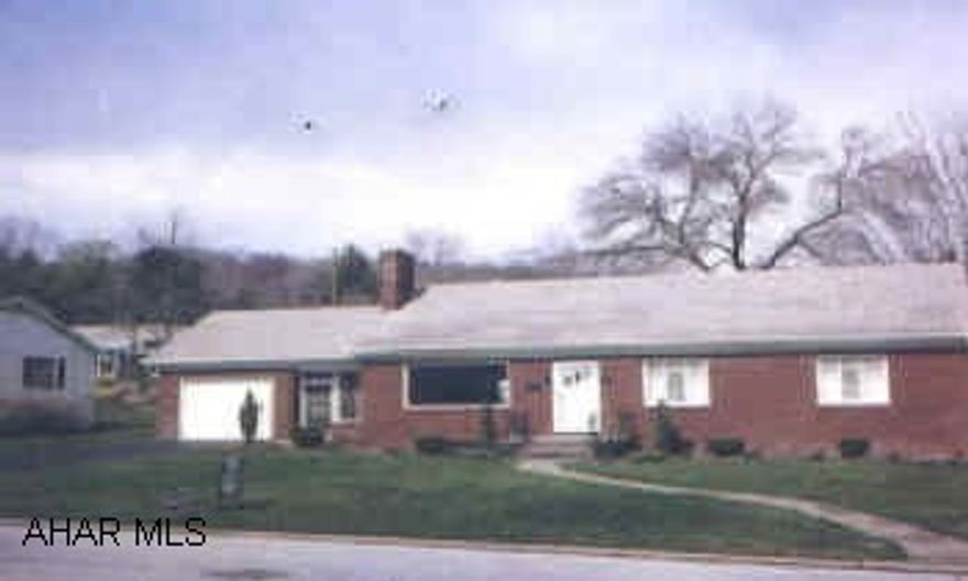 Attractive brick rancher on quiet street, central air, large level lot, fireplace, garage and much more.