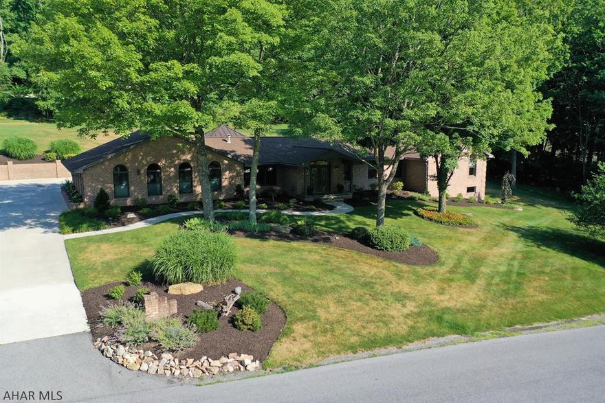 Incredible, meticulously maintained, sprawling ranch home just minutes from downtown Bedford & the Omni Bedford Springs Resort. Ceramic tiled main entry foyer; great room w/ cath ceiling; kitchen w/ granite, islands and tiled floor; dining & sitting areas off kit; extensive owner suite bedroom w/ custom tile bath & walk-on closet w/ built-ins; bedroom w/ cath ceiling & ensuite bath; bedroom w/ cath ceiling; bedroom w/ oak floors; tiled laundry rm w/ sink & cabinets; & a tiled 1/2 bath. Basement offering a rec room w/ fireplace & bar; bedroom; full bath; den; & ample storage. Radiant floor heat; heat pumps w central air; & central vac. Custom inground pool; outdoor kitchen; propane fireplace & outdoor bars. 3-car attached garage; pro-landscaping; & con. driveway. Truly a stunning property!!