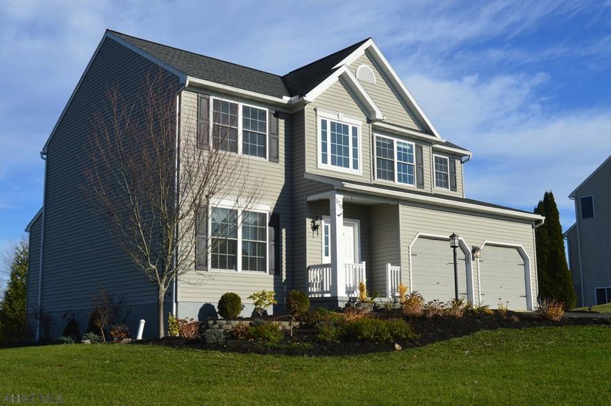 This wonderful 2 story home is nestled on a cul-de-sac in the highly desirable Grove Park neighborhood. Boasting an open floor plan, 4 bedrooms, 2.5 bathrooms, 20'x20' deck, and a two-car garage. The first-floor features 9' ceilings, an oversized family room, a cozy breakfast nook, a thoughtful kitchen layout including an island, and a cheerful morning room with a cathedral ceiling. Upstairs contains a large owner's bedroom with a walk-in closet and full bathroom. The basement also features 9' ceilings, a home theatre room, a large storage area, space for a future bathroom, and spaces for a playroom, an office, and/or a hobby room. Many updates throughout this home in the last few months include radon mitigation, fresh paint, new carpeting, new lighting, new bathroom flooring and more!