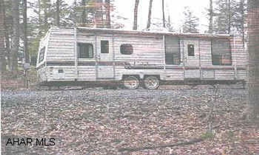 Gated community- 1989 Citation Camper w lot. Really nice camper- must be seen!