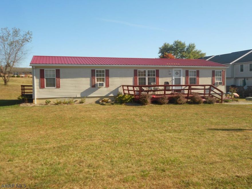 If you have been looking for an affordable alternative to renting, look no further. Side lot included which makes it possible to add on or build the garage of your dreams. 3 bedrooms and 2 full baths with laminate floor through out for easy maintenance. Open floor plan in living room, dining and kitchen areas. New metal roof in 2014, propane forced air heat. Full unfinished basement with multiple uses. Sits on 0.809 acre. Call today to see!