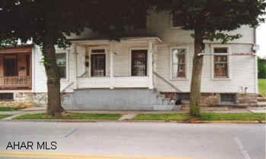 Well built 3BR, 1.5BA home.  Property is divided.  Could easily be duplexed.  1/2 BA only on one side. Great investment property.  Home is divided with 1/2 BA only on left side.  Right side is ready to go!