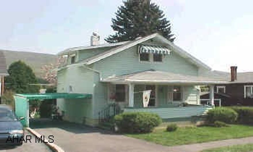 Two story vinyl sided.  Vinyl thermo windows.  Great house.  Must see.  Two full baths, one on first floor.  Finished basement.