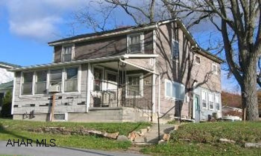 Two story home on large lot with lots of potential. Sewer hook-up just completed.