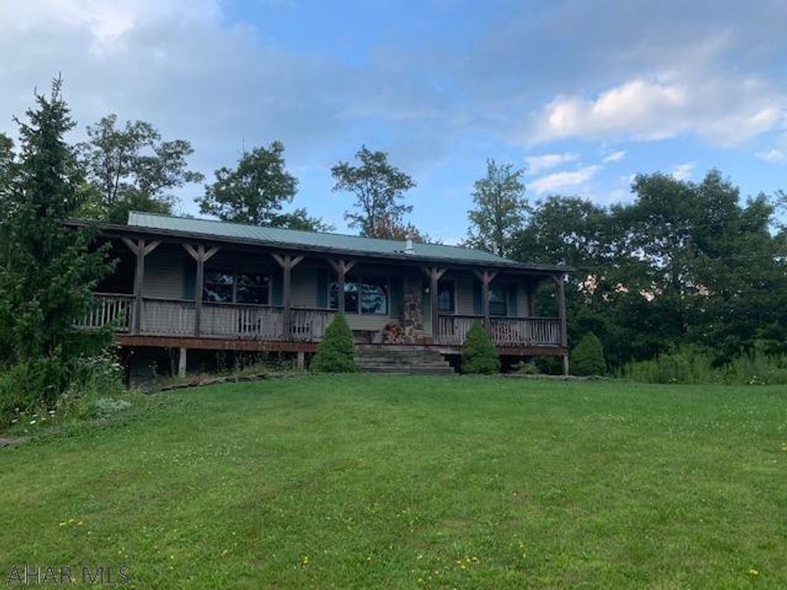 If your looking for a home that is surrounded by woods and wildlife this is the home for you, total Privacy on 3 acres near Blue Knob!! Also features a spring fed pond and large open pasture great for horses. There is a large 36x28 detached garage   and one car integral garage. Lots of room for RV or camper parking. The detached garage could easily be converted to barn style for animals. Must see call today for a showing.