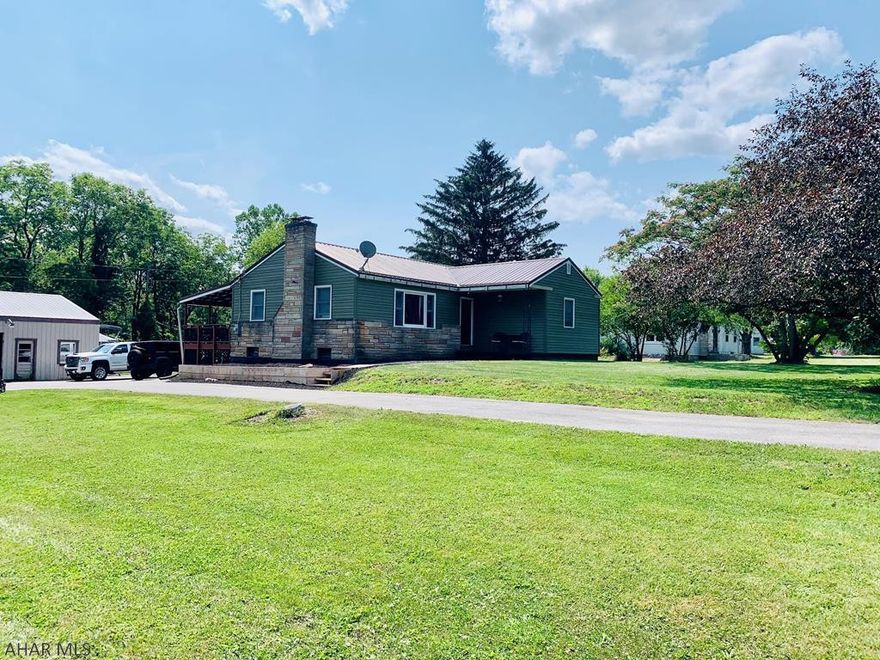 Beautiful 3 bed 1 bath remodeled home in the Hollidaysburg School district.  If you are looking for a quiet, private setting with room for entertaining, acres for all the toys and still be close to shopping, restaurants, grocery shopping and more then this is the property for you.  It has a brand new roof, new siding, new septic system, furnace, hot water heater, electric panel, flooring, bathroom, soft water system, and all new appliances. It also has a huge 40x30 garage with a paved driveway.  The covered back deck with a stream that runs in the back of the property provides a relaxing place to end your days.   Literally bring your belongings and move right in.  This is a must see!