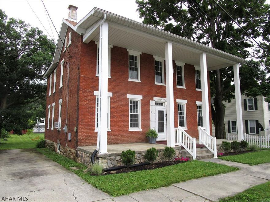 Very nicely updated and renovated two-story brick home!! Double-story front porch, rear patio, and large flat yard.  The main level features a foyer with open staircase, living room, dining room, kitchen with hickory cabinets, laundry room and a full bathroom. Second level offers four bedrooms, a full bath and a bonus room. New Bosch hot water natural gas furnace with three zones, thermo pane replacement windows, 200-amp electric and pex plumbing. Basement with walk-out steps and a floored attic for storage. Super convenient location and close to all amenities in the borough. This is a really nice home that is completely move-in ready!!!