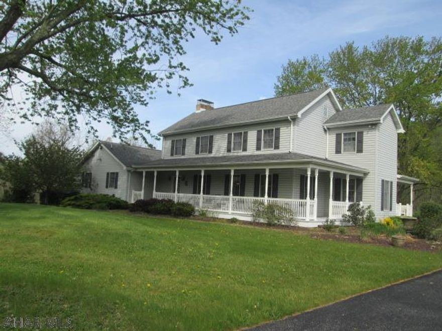 Country charm at it's finest. This 5300 sq ft home is situated on a beautiful 4.3 acre lot. First floor features a large totally updated kitchen with commercial grade range and SS throughout. Meals can be served in the kitchen area or the formal dining room. The large family room has a masonary fireplace. First floor den or possible bedroom. Don't miss the huge 4 car garage.