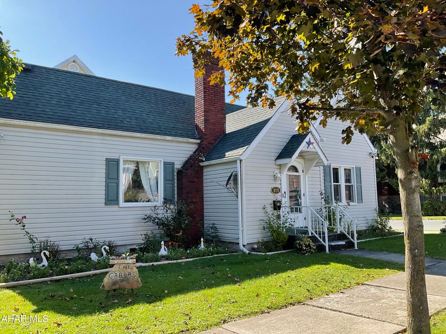 Lovely Home on a large Corner Lot. Natural Wood Doors, Hard Wood Floors! Gas Fireplace, Beautiful Archway in the Foyer welcomes you into this cozy home. Partially Fenced in Yard, 1 Car Garage, Vinyl Windows. Large Basement with high ceilings just right for finishing to your design. Home has been well maintained. Covered Back Porch for entertaining. 
New Carpet in LR, Hall. New Windows & New Bath Vanity.