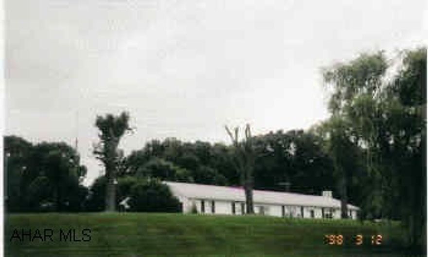 Ranch Home, pleasant location, many upgrades.  Garden, fruit trees, weeping willow and spruce trees. New roof in 1995, Heat / Hot water is wood-oil-coal combination, new kitchen counters, house is wired for a generator