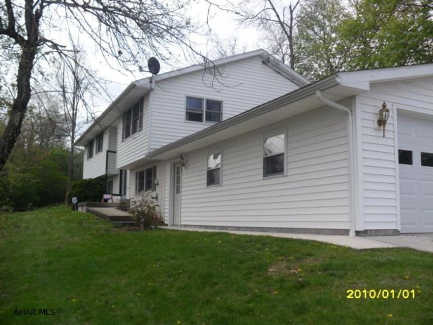 Lovely home in the borough on a private lot. Great view. Large, oversized, heated 2 car garage added in 2007. Heat pump and new central air added in 2013. Master bedroom with large master bath. 2 sheds add lots of storage.