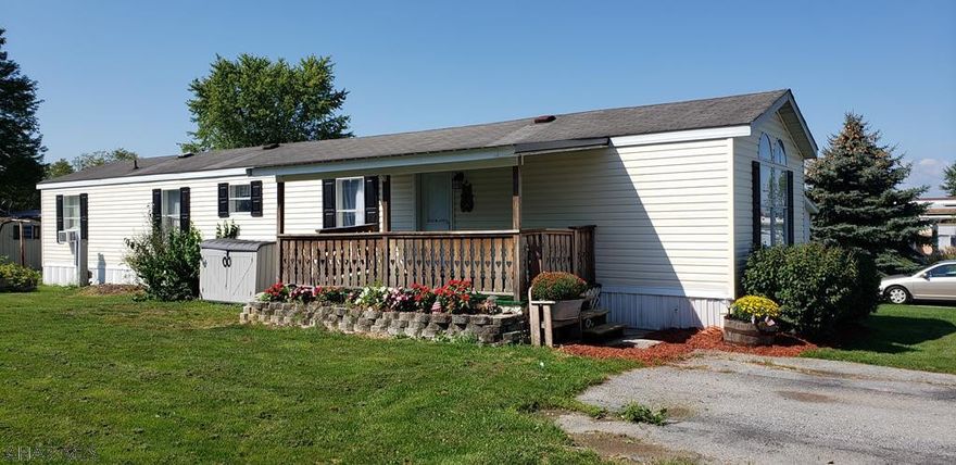 THIS SPACIOUS SINGLE-WIDE HOME IS READY TO MOVE IN AND ENJOY.  THE VAULTED CEILINGS AND OPEN FLOOR PLAN WELCOME YOU.  ENJOY COOKING WITH THE UPGRADED STAINLESS-STEEL APPLIANCES.  HOME HAS SOME NEW FLOORING.  RELAX ON THE LARGE DECK OR STROLL TO THE POND TO FEED THE DUCKS.