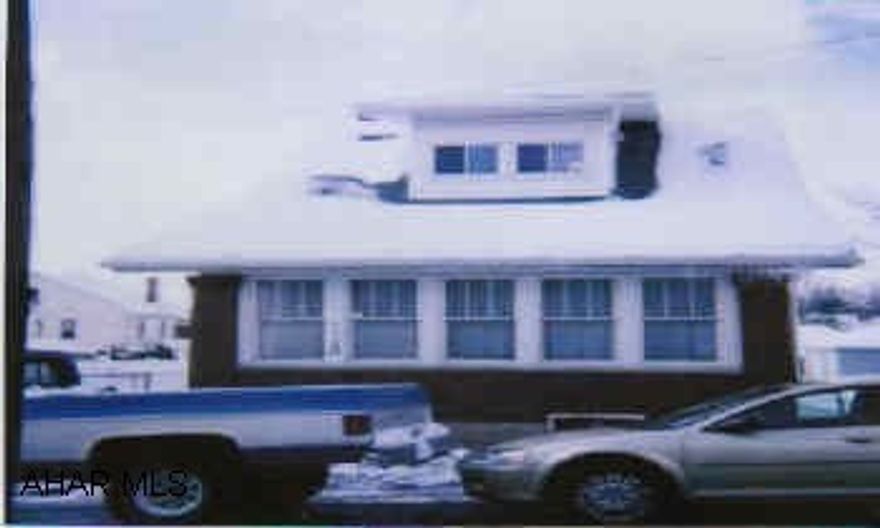 Nice 2 bedroom home with fenced yard, extra parking, space included in rear of property.