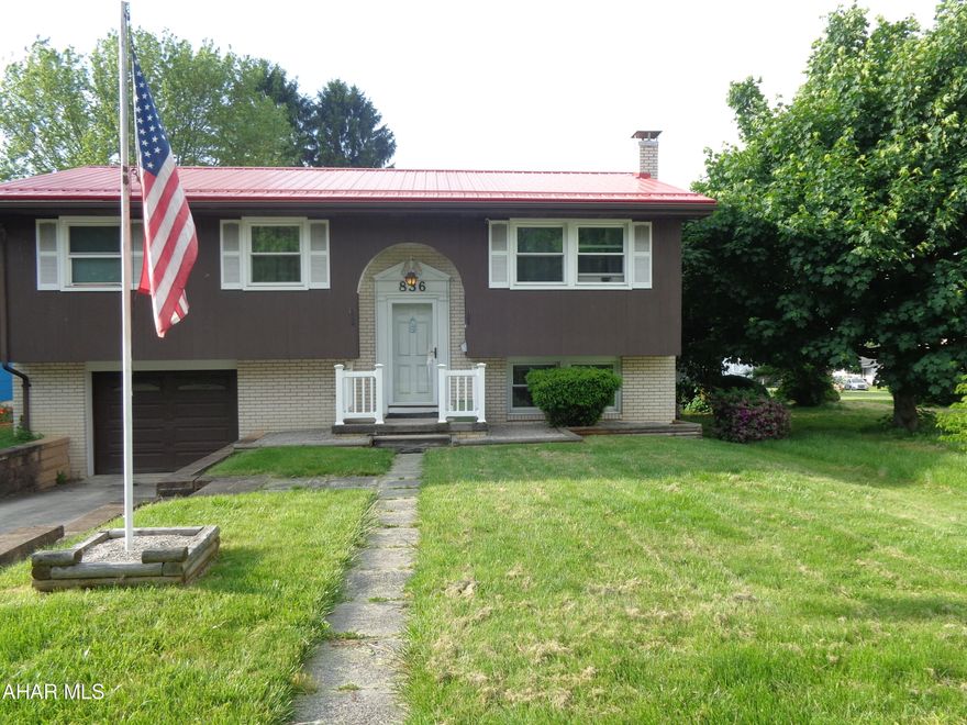 Beautifully maintained Portage home with many updates.  Fantastic new kitchen with stainless steel appliances included.   All new windows with a transferable warranty.  Lovely new bathroom with ceramic tile tub surround.  New metal roof.  Also new flooring.  Nice, flat, fenced in yard.  Partially finished basement with an additional bonus room & a garage.