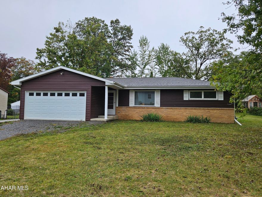 Charming 1970 Ranch in a highly desired area! This well-maintained home features beautiful hardwood floors throughout and a brand-new master bathroom for modern comfort and accessibility.  The home offers a lot of ADA compliant features.  A huge basement, high ceiling basement awaits your vision to finish and double the living space!  The oversized one-car garage provides plenty of space for parking and storage. Enjoy the large yard—perfect for gardening, entertaining, or simply relaxing outdoors. A rare find in a sought-after neighborhood, this home blends classic ranch style with thoughtful updates.