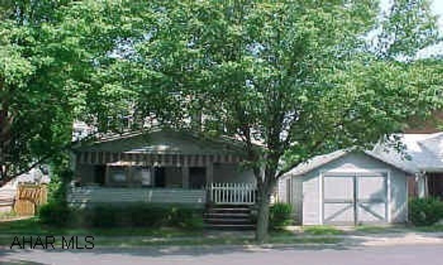 full of charm and character.  Totally spotless.  boro 2 story w/fenced in yard, drywalled 1 car garage w/electric, hardwood floors throughout and cherry kitchen.  Nice size closets and bathroom.