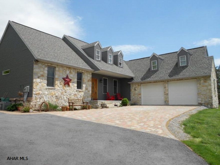 Beautiful stone home on a cul-de-sac, w/open floor plan and splendid view! Kitchen with maple cabinets and ceramic floor, recently updated with granite counter tops opens to a dining room and living room with vaulted ceilings and lots of windows offering natural sun light. Newly painted rooms. Oversize 2 car finished garage (30X21). Expansion opportunity exists on the 2nd fl. for a 12X16 fourth bedroom. Basement offers additional space for rec. room, bedroom & bath. Possibilities are endless in this charming home with many upgrades. Professionally landscaped, UPDATED!!! Paver apron to the front entrance and garage. Back yard is very private with large patio. Conveniently located to schools, shopping and I-99. Owner will entertain reasonable offers!!