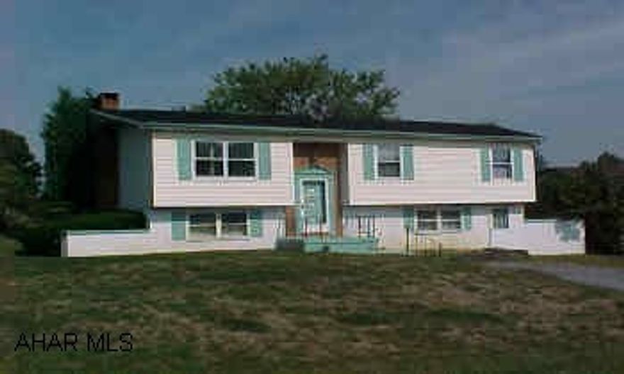 Bi-Level on large lot. New pool liner & concrete surround, heated pool with propane. 200 AMP service, time of day electric heat. Needs new carpet.