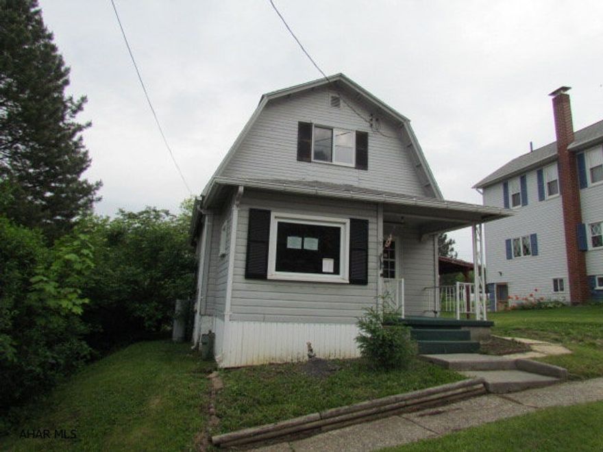 1.5 story wood sided home has some thermo pane windows, city water and sewer, Oil forced air heat, gas pace heater and 100A electric. This great starter home is nestled in the Roaring Spring Borough. Featuring a large oak kitchen with plenty of cabinets. Some TLC could make  this 2 bedroom home cozy. Detached workshop, 2nd floor storage, covered patio.