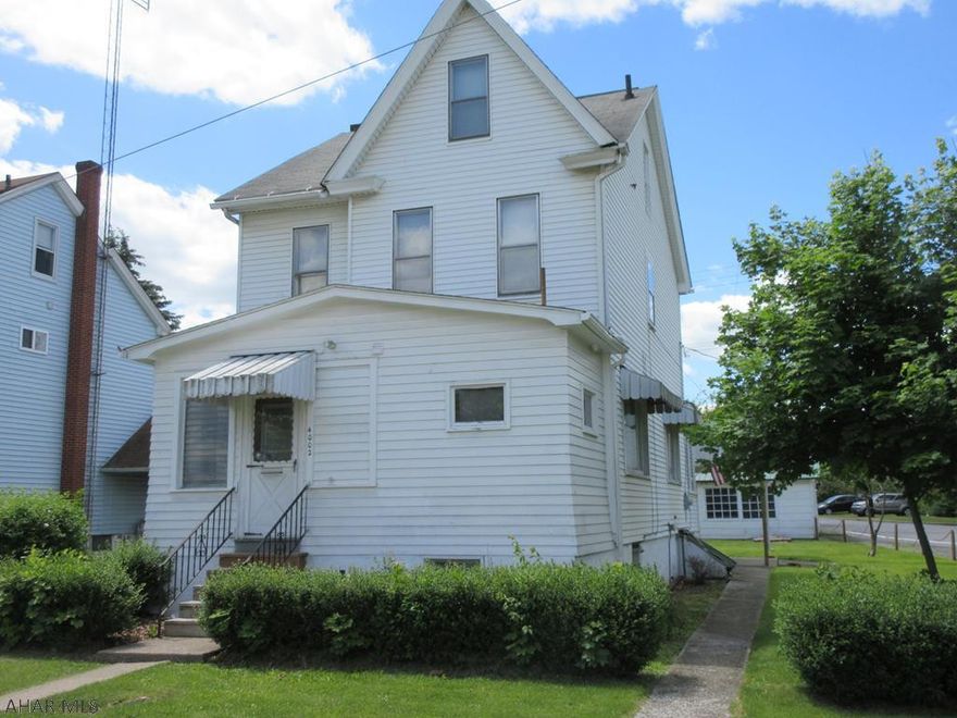 Large Eldorado area 2.5 story home with large living room, formal dining room, family room, spacious kitchen plus 2 full baths including one on first floor. 3 nice sized bedrooms and large finished attic. Large covered rear patio, 2 car detached garage with workshop plus off-street parking. Enclosed front and back porches, walk-out basement, fire ring.