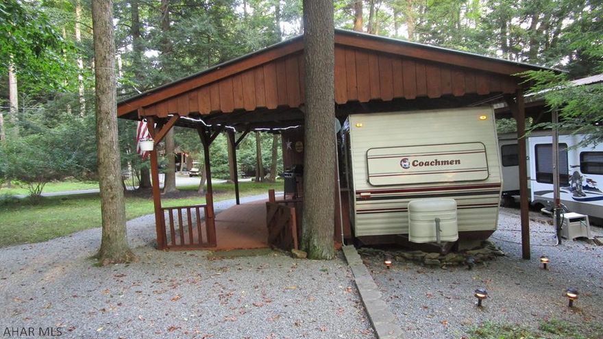 Spacious campsite with well maintained camper.  Private lot.  Large fire pit area.  Shed.  Golf cart included with full price offer.  Adjacent property is also for sale if you have a camping buddy.  Located in Glendale Yearound, a gated recreational community adjacent to Prince Gallitzin State Park /  Glendale Lake.  Six miles from Rock Run ATV Park.