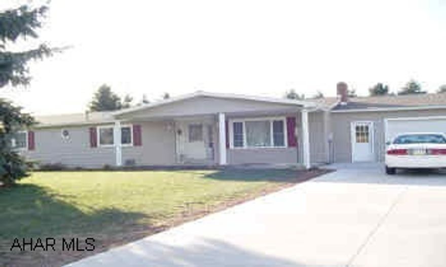 Spacious one story living. Large one car attached garage. Convenient to convenience store, restaurant, school, bank. Concrete driveway. Seller will purchase Home Warranty for buyer.  Large master bedroom with 3/4 attached bath, and walk in closet. Unheated enclosed porch. Sewer to be available in near future.