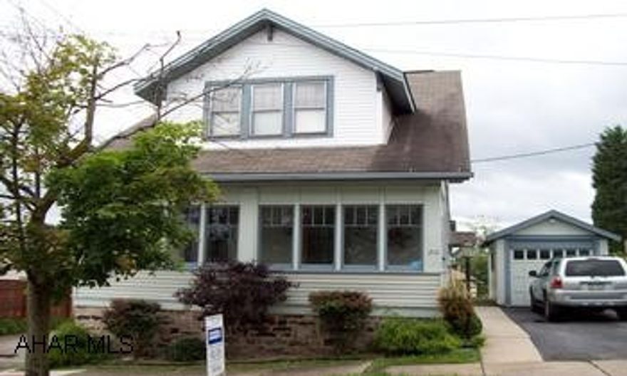 THIS HOME HAS A GORGEOUS INTERIOR WITH 3 GOOD SIZED BEDROOMS AND A FINISHED ATTIC.  LOT IS SHORT, BUT IT HAS A GARAGE AND A DRIVEWAY.  CHERRY KITCHEN.  HOME WARRANTY.