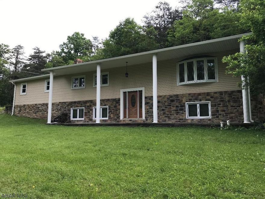 Split entry home on 5.42 acres completely remodeled, first floor laundry modern kitchen with stainless steel appliances, finished basement with family room and fire place.